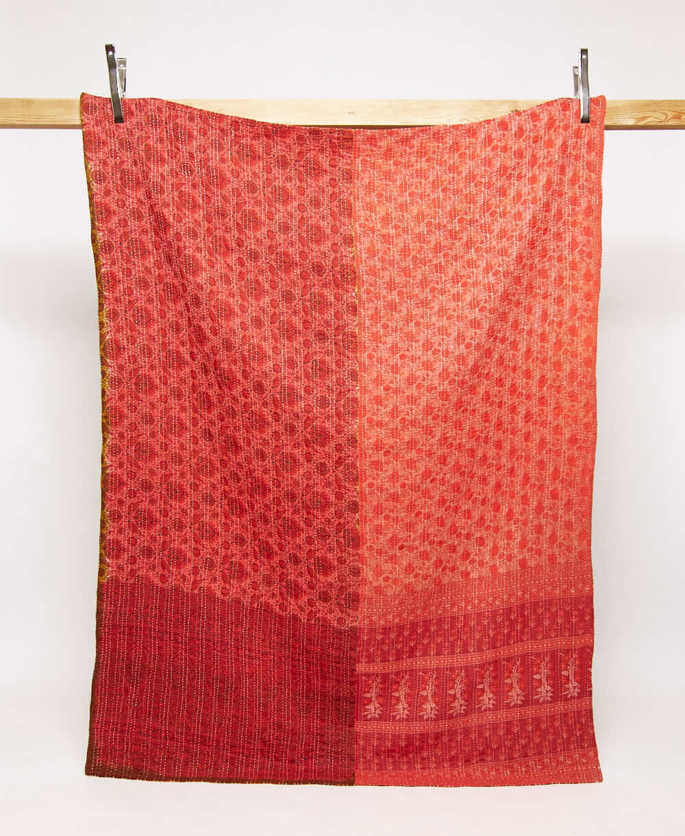 coral & red twin kantha quilt in a floral pattern handmade in India