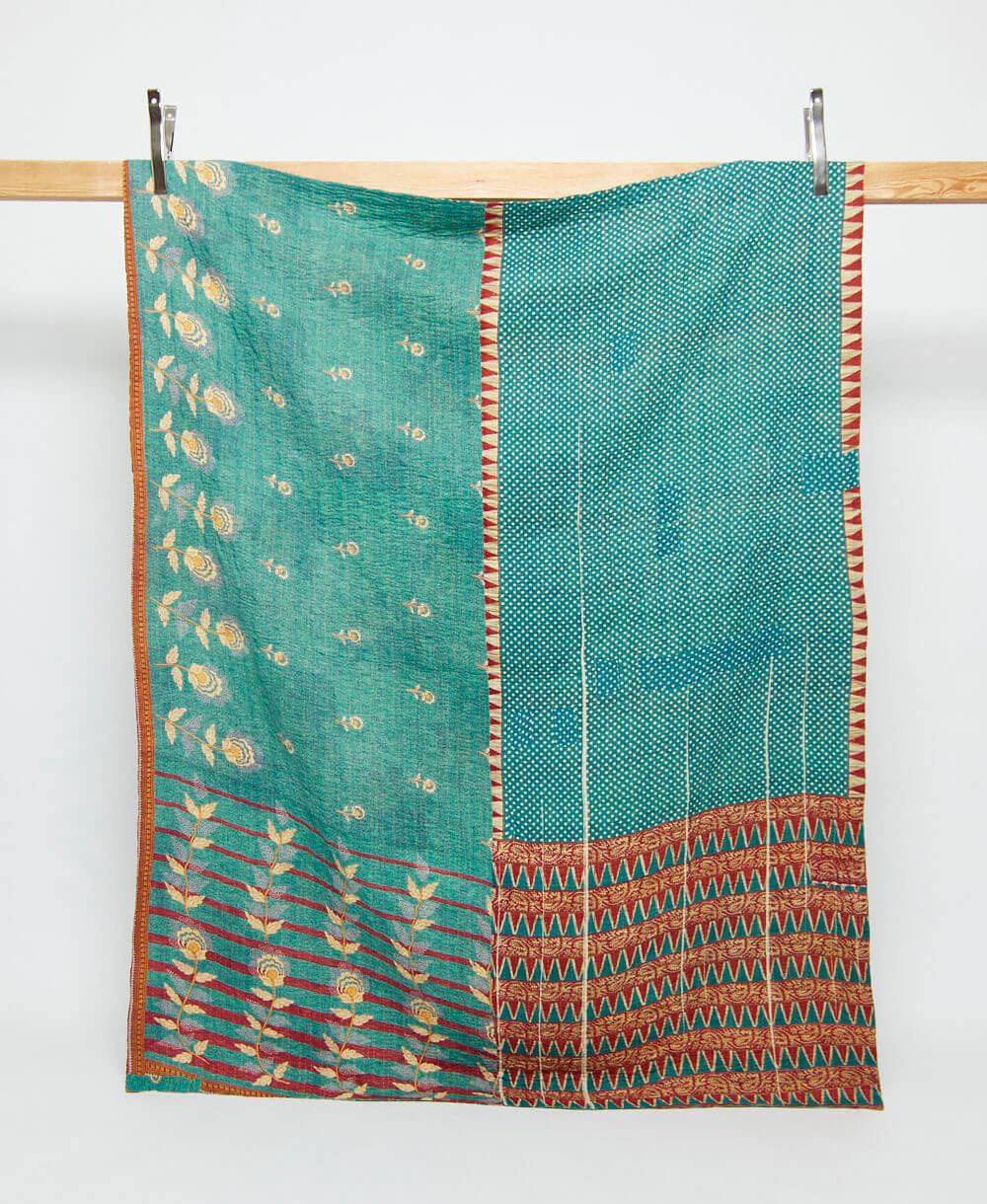 persian green twin kantha quilt in a floral pattern handmade in India