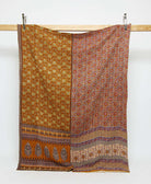 camel brown twin kantha quilt in a mustard floral pattern handmade in India