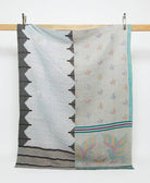 grey twin kantha quilt in a novelty bird pattern handmade in India