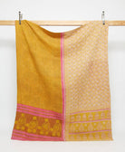 sunshine yellow twin kantha quilt in botanical leaf pattern handmade in India