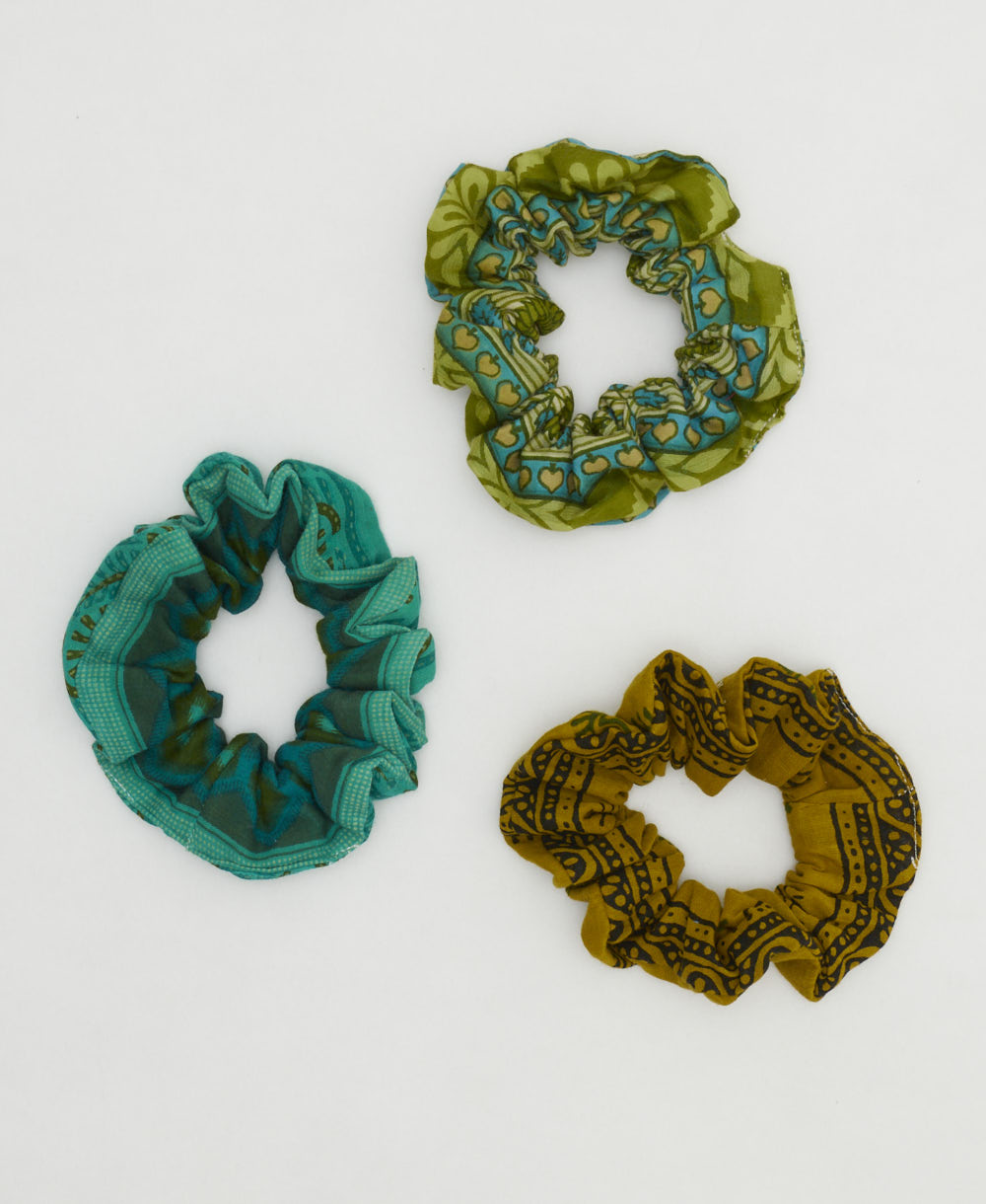 group of three one-of-a-kind unique green vintage cotton scrunchies on white background