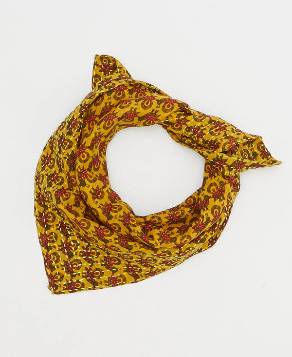 artisan-made vintage cotton bandana in a mustard bird design
