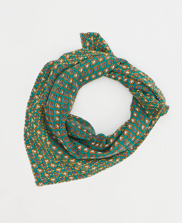 artisan-made vintage cotton bandana in a teal geometric design
