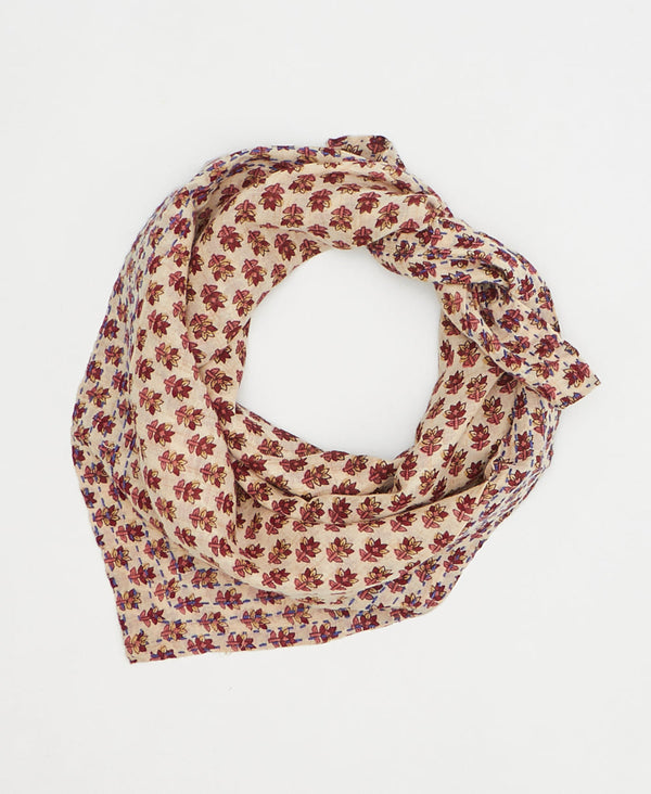 artisan-made vintage cotton bandana in a pink and marron floral design
