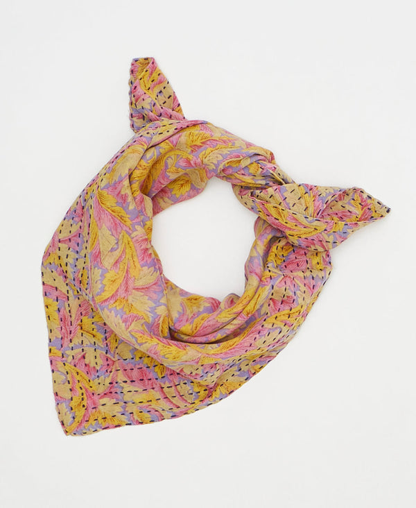 artisan-made vintage cotton bandana in a pink and yellow leaf design

