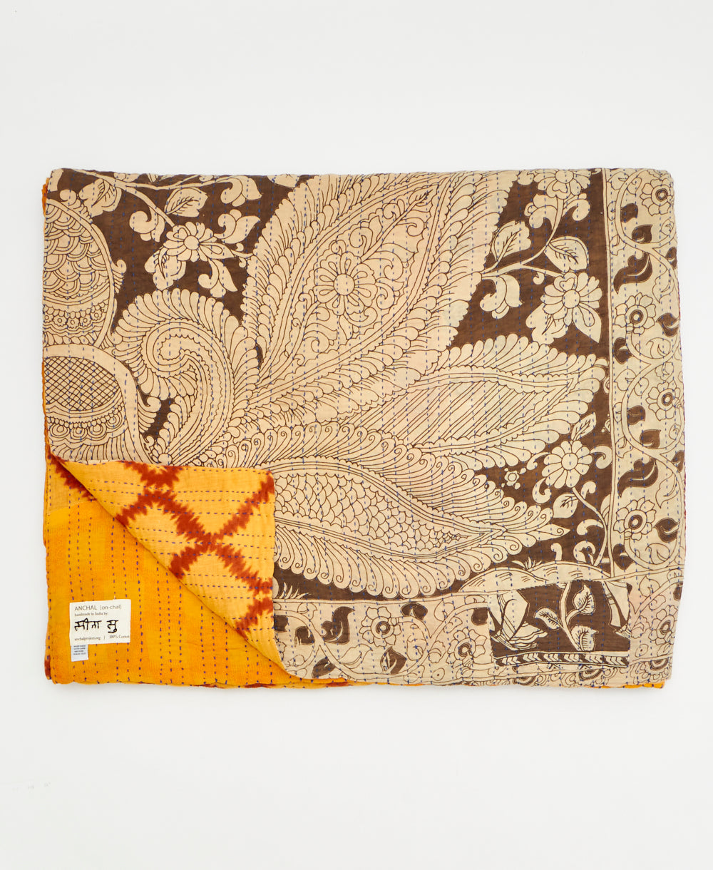  Artisan-made king kantha quilt in a golden yellow traditional  design made from upcycled saris
