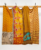 King kantha quilt in a golden yellow traditional pattern handmade in India
