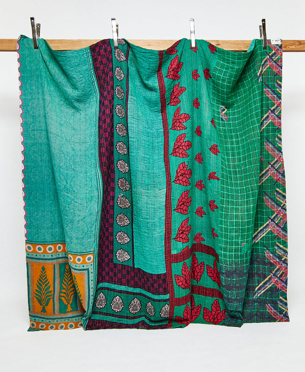 King kantha quilt in a teal geometric pattern handmade in India
