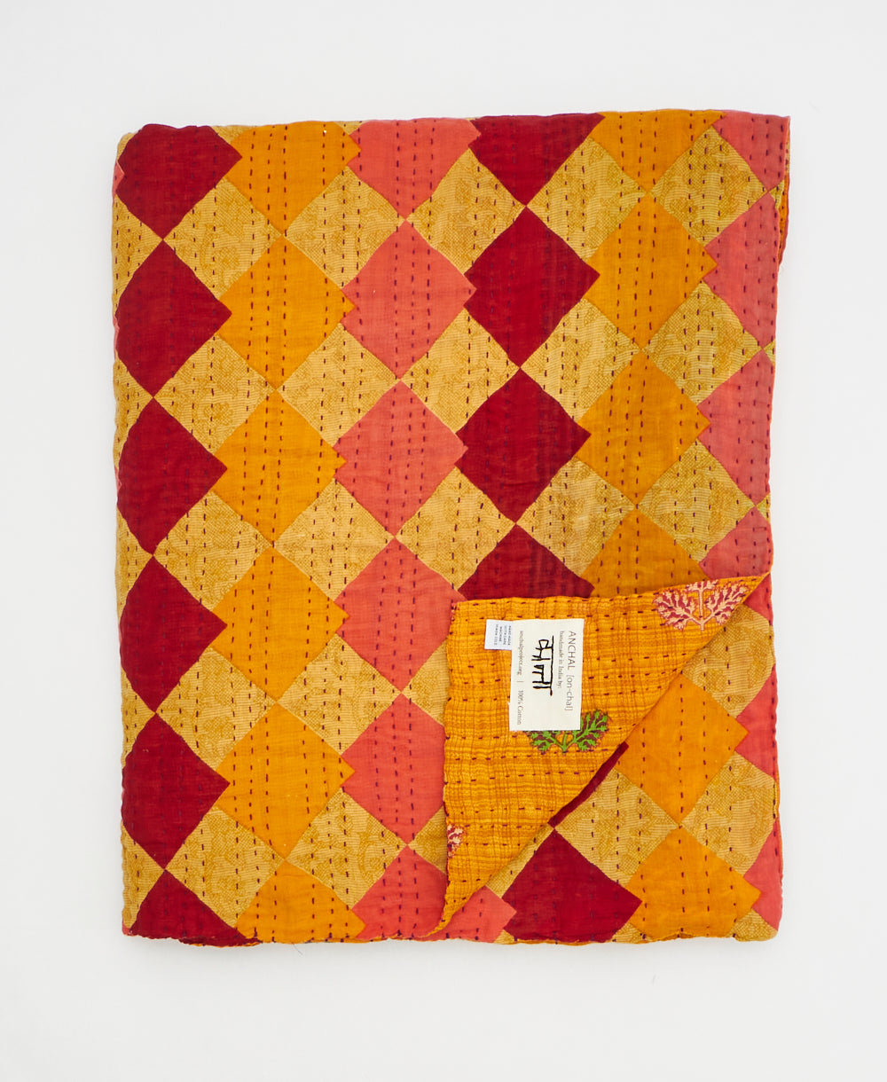 Artisan-made twin kantha quilt in yellow geometric design made from upcycled saris
