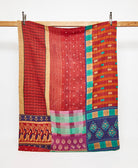 Twin kantha quilt in a colorful traditional  pattern handmade in India
