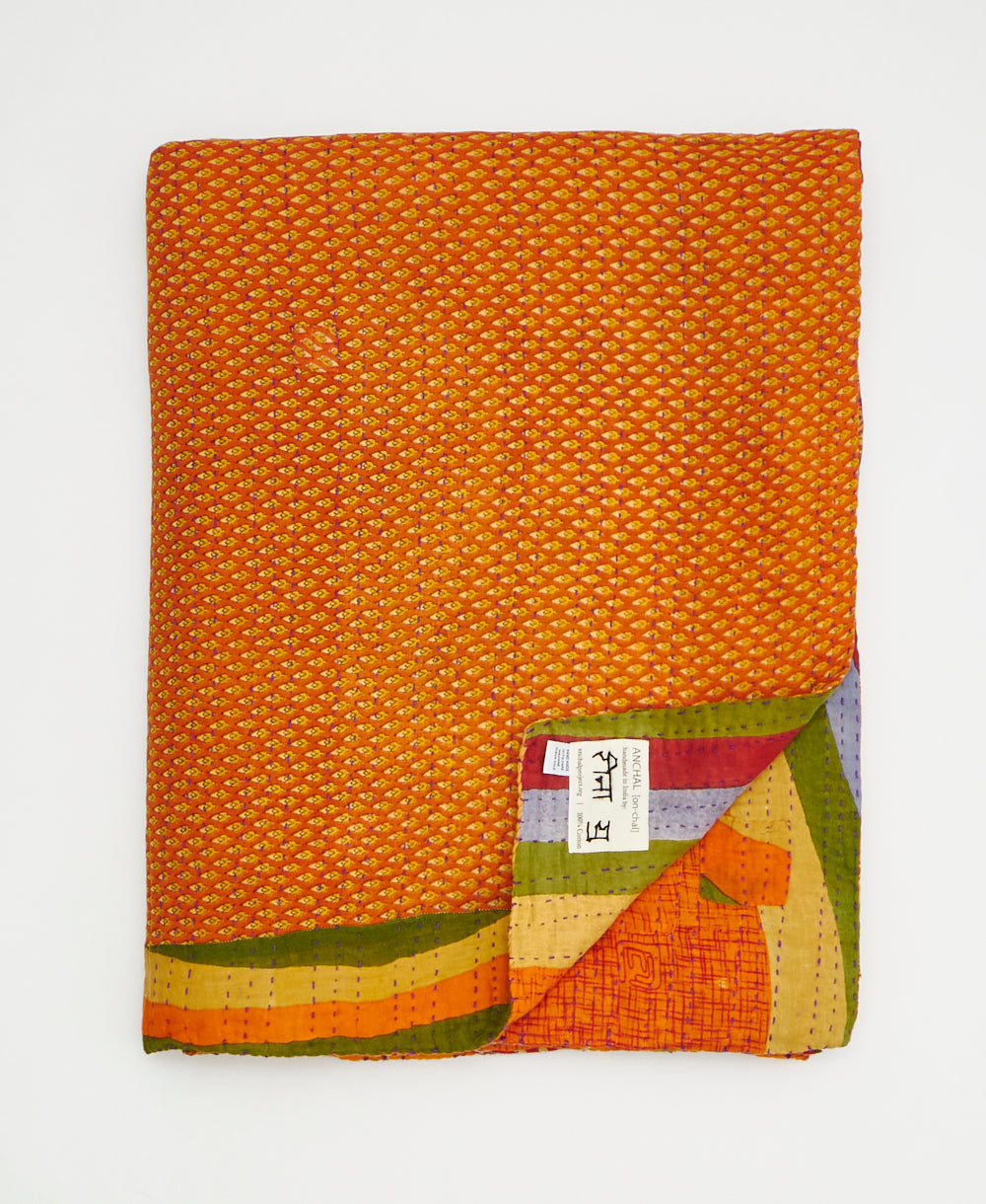 Artisan-made twin kantha quilt in bold geometric design made from upcycled saris
