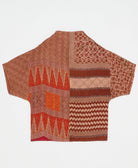 ethically made quilted jacket in a brown swirl print handmade by artisans in India