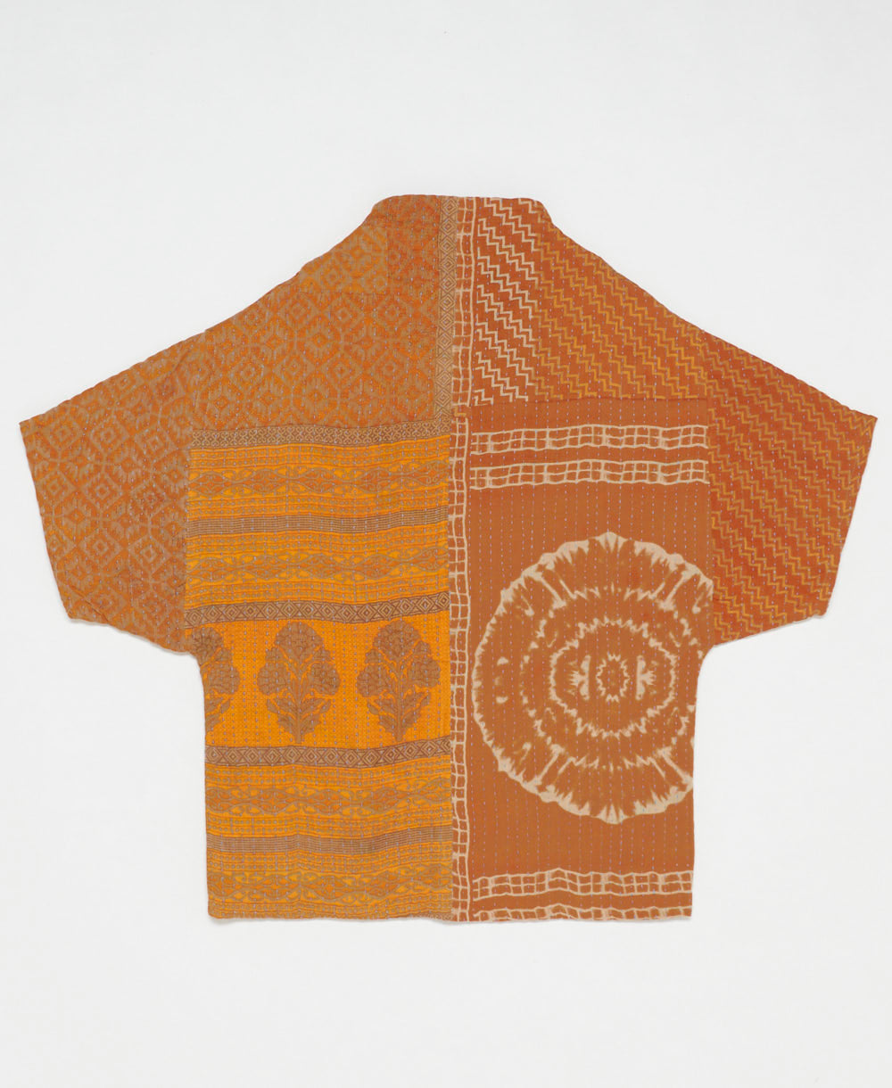 ethically made quilted jacket in a orange chevron print handmade by artisans in India