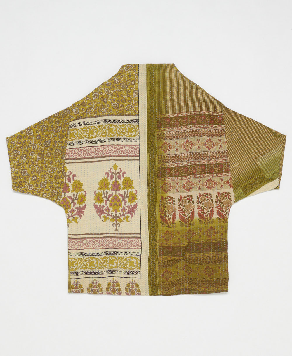 ethically made quilted jacket in a yellow-green floral print handmade by artisans in India