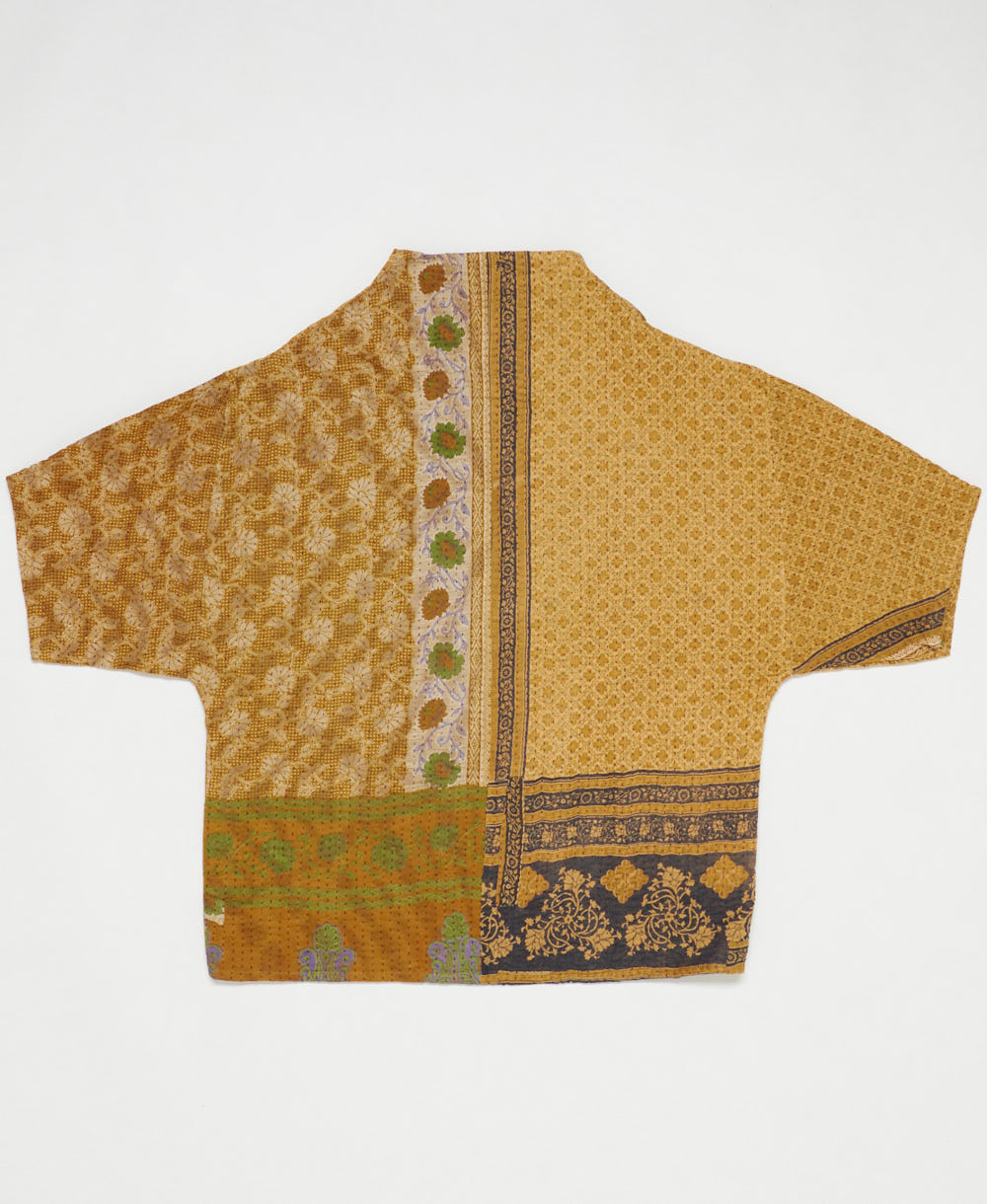 ethically made quilted jacket in a yellow-orange floral print handmade by artisans in India