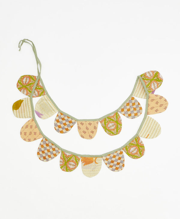 upcycled fabric garland with bold pastel striped floral pattern by Anchal
