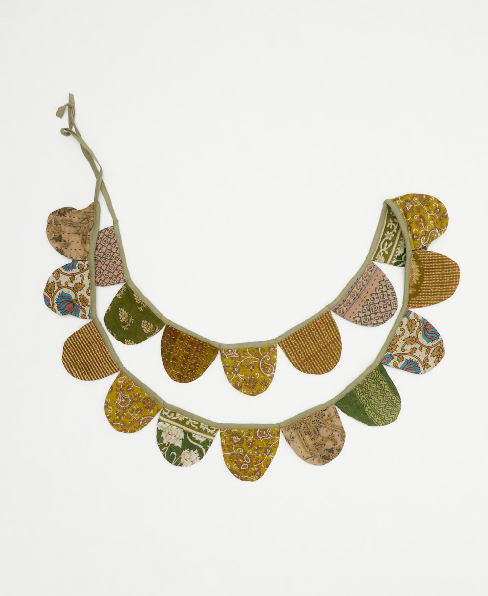 handmade kantha scallop banner in a sage green floral print