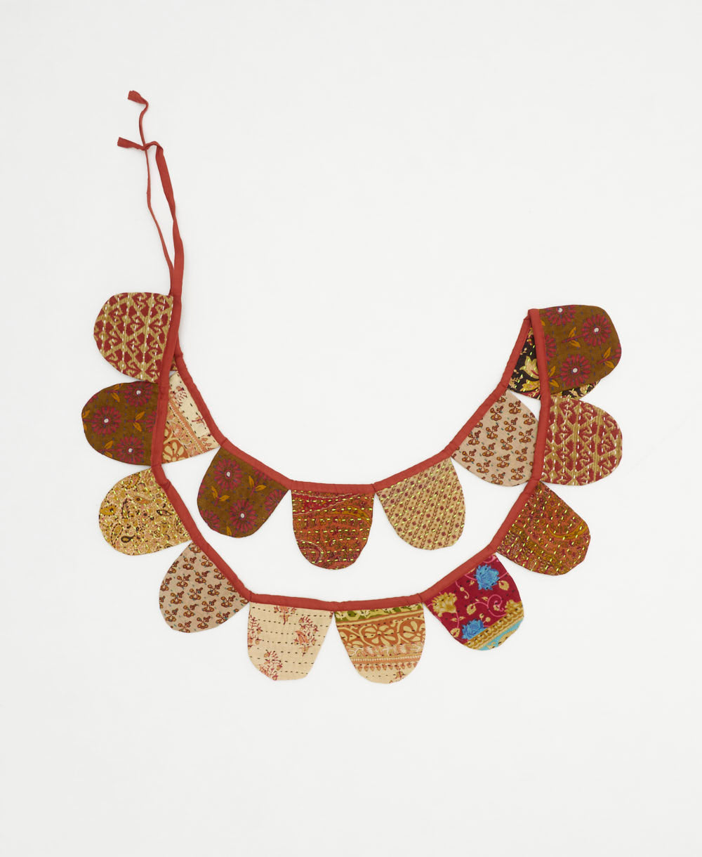 handmade kantha scallop banner in a rust & tan geometric print