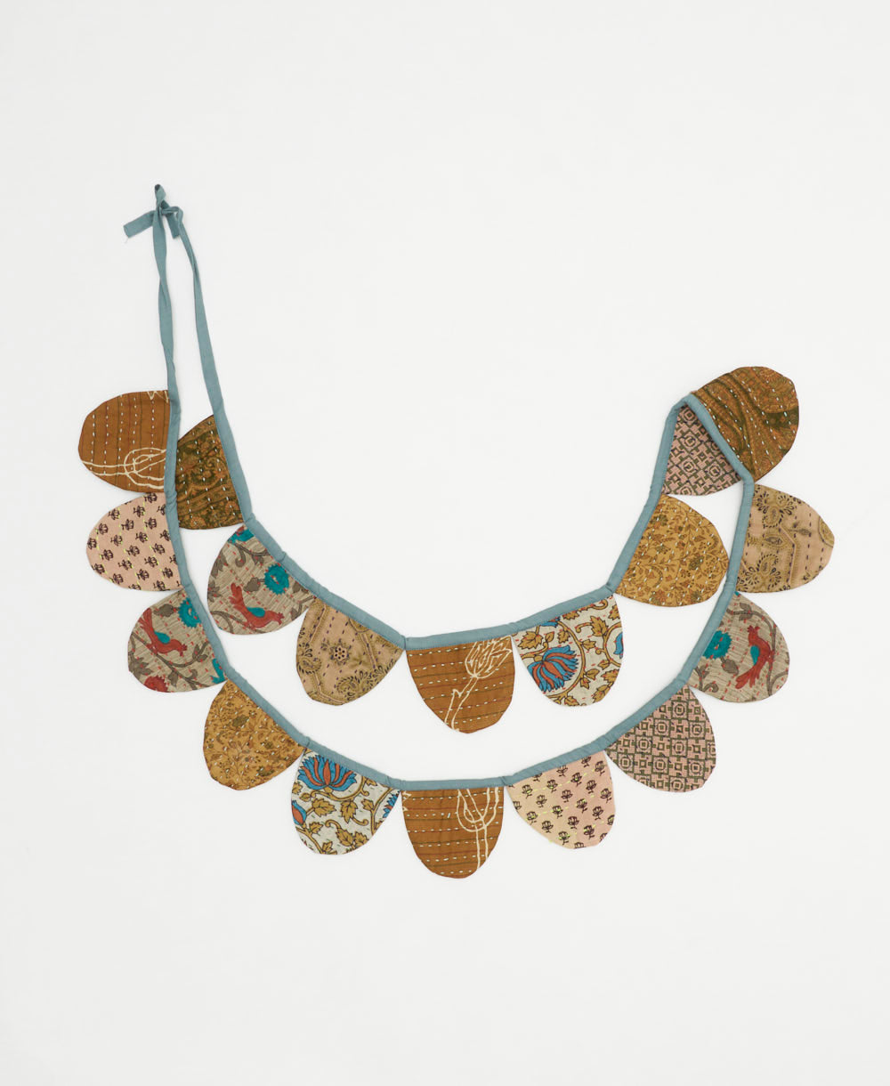 handmade kantha scallop banner in a denim blue & camel floral print