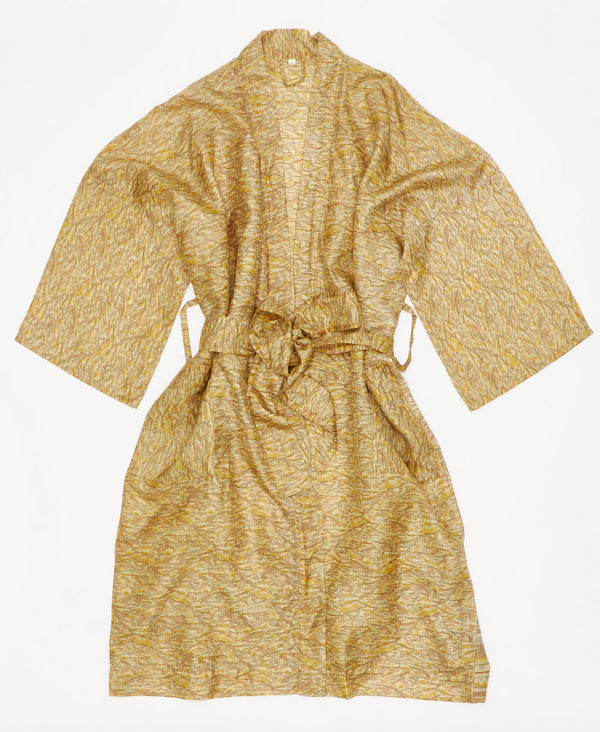 This beige silk robe is ethically made using recycled
vintage silk saris