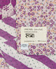 Purple small Kantha quilt throw featuring the hand-stitched
signature of the maker
