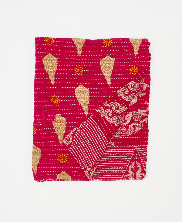 Red kantha quilt throw made using traditional
recycled vintage saris