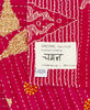 Red small Kantha quilt throw featuring the hand-stitched
signature of the maker