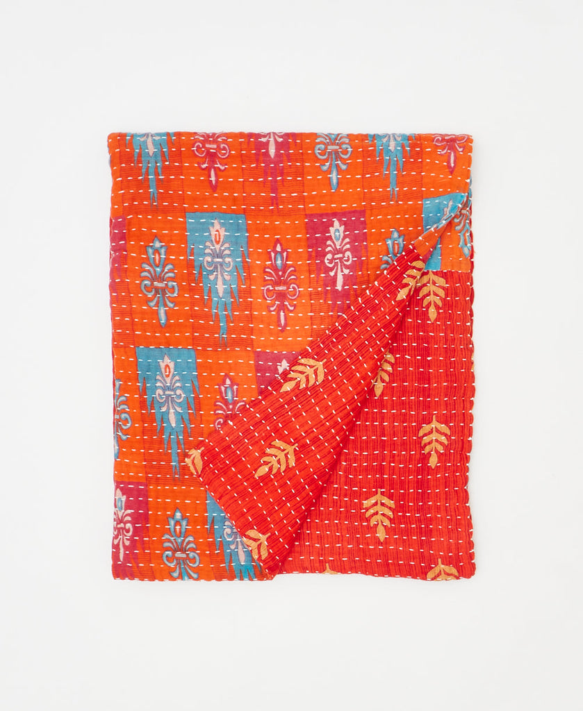 Orange kantha quilt throw made using abstract print 
recycled vintage saris