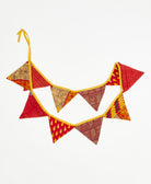 upcycled fabric garland with bold red and yellow abstract print pattern by Anchal
