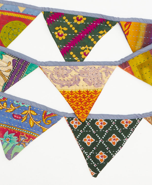 handmade colorful abstract triangle fabric garland 
