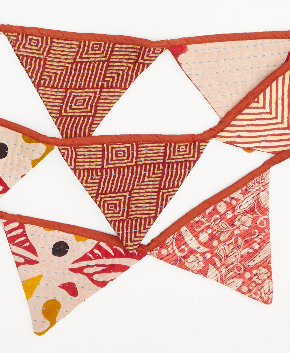 handmade burnt orange geometric  triangle fabric garland 
