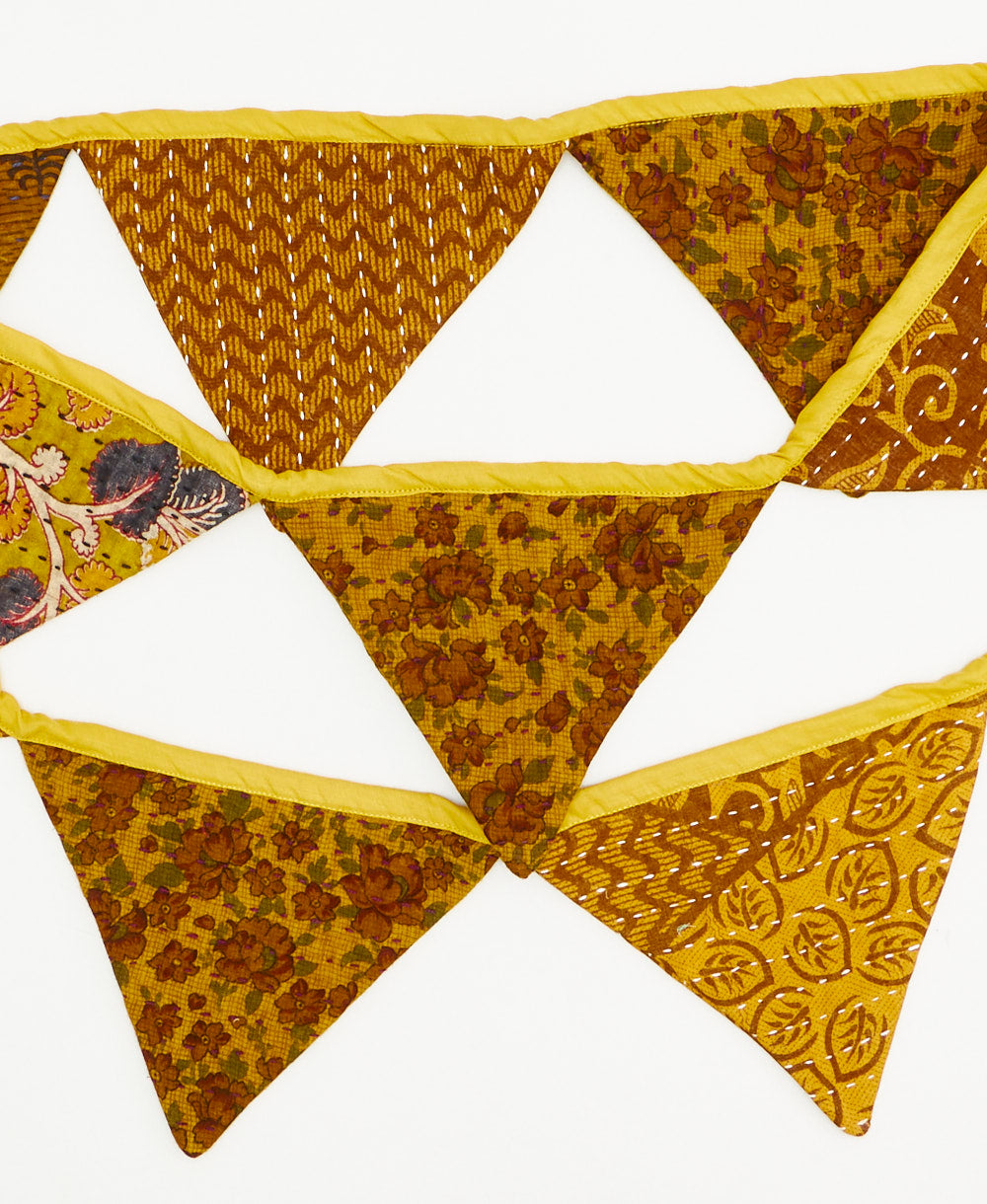 handmade yellow floral triangle fabric garland 
