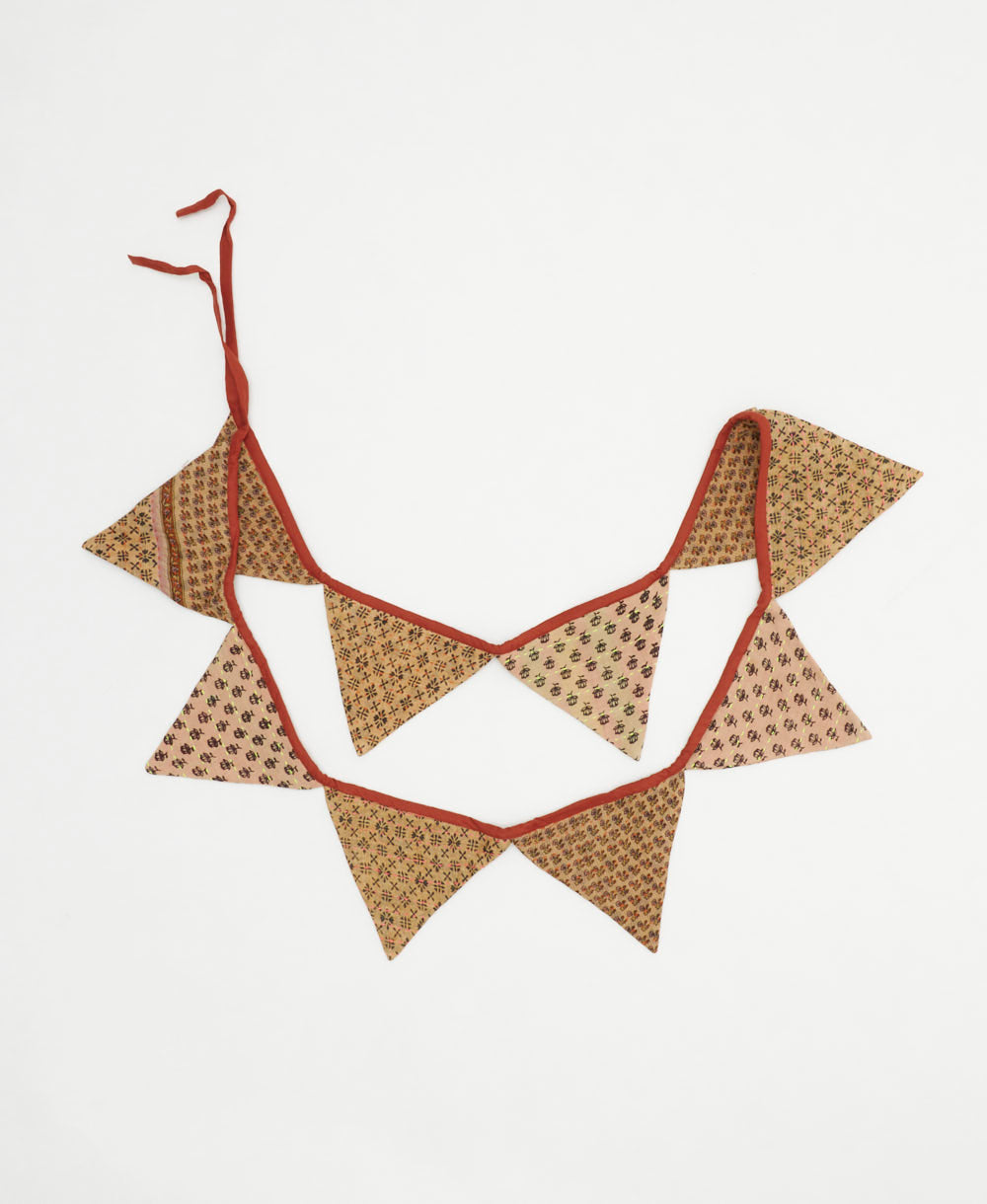 sandy beige & tan subtle floral printed pennant banner made in India from scrap fabrics