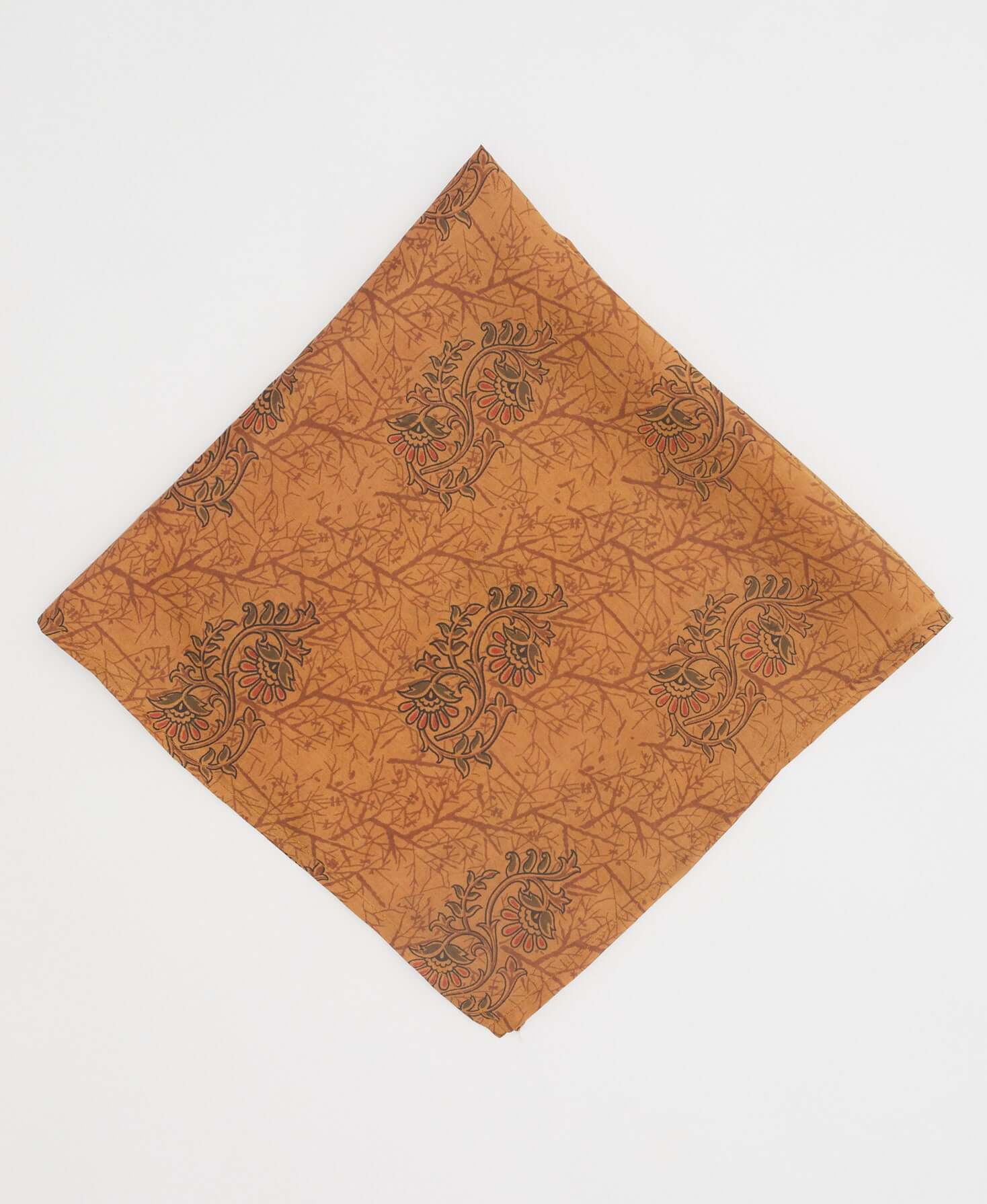 Burnt orange silk bandana featuring a brown branch print