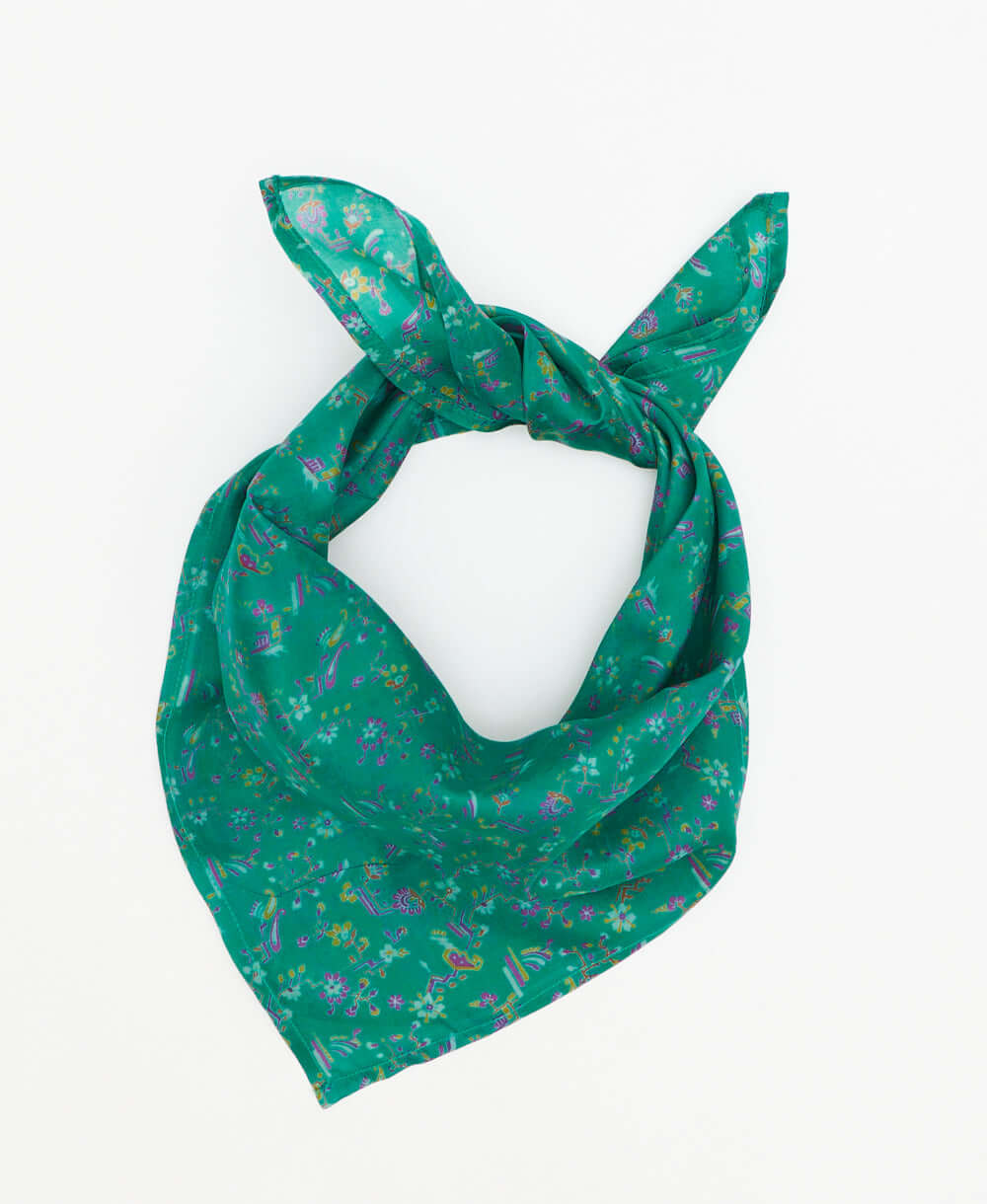 teal silk bandana with small purple and orange flowers 