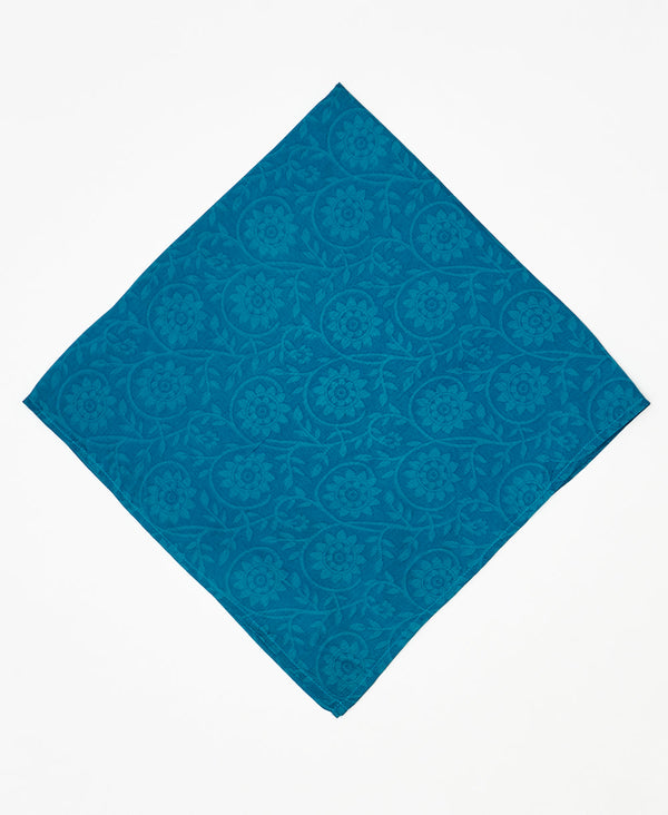 vintage silk scarf featuring an undertstaed blue floral pattern created using sustainably sourced saris