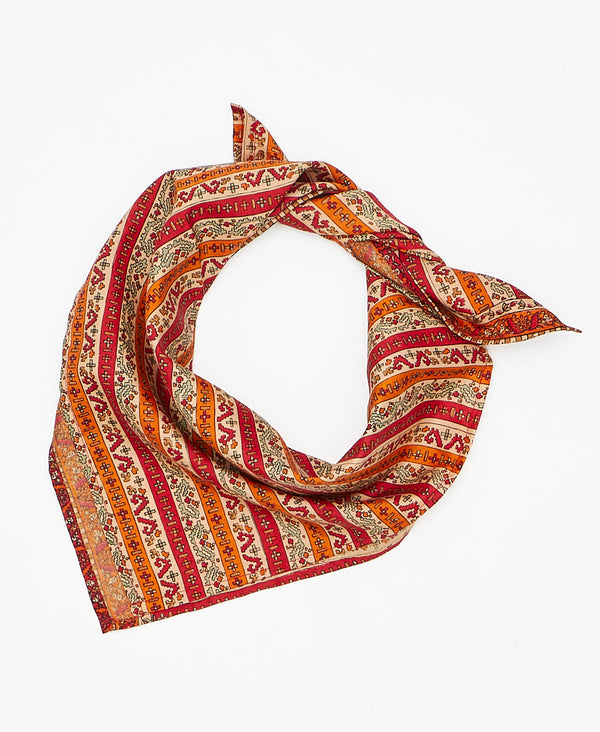 Orange and red silk scarf handmade by women artisans using upcycled saris