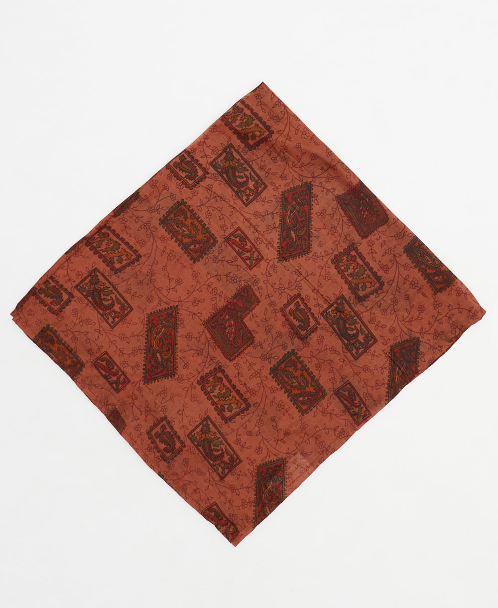 vintage silk scarf featuring a burnt orange geometric paisley pattern created using sustainably sourced saris