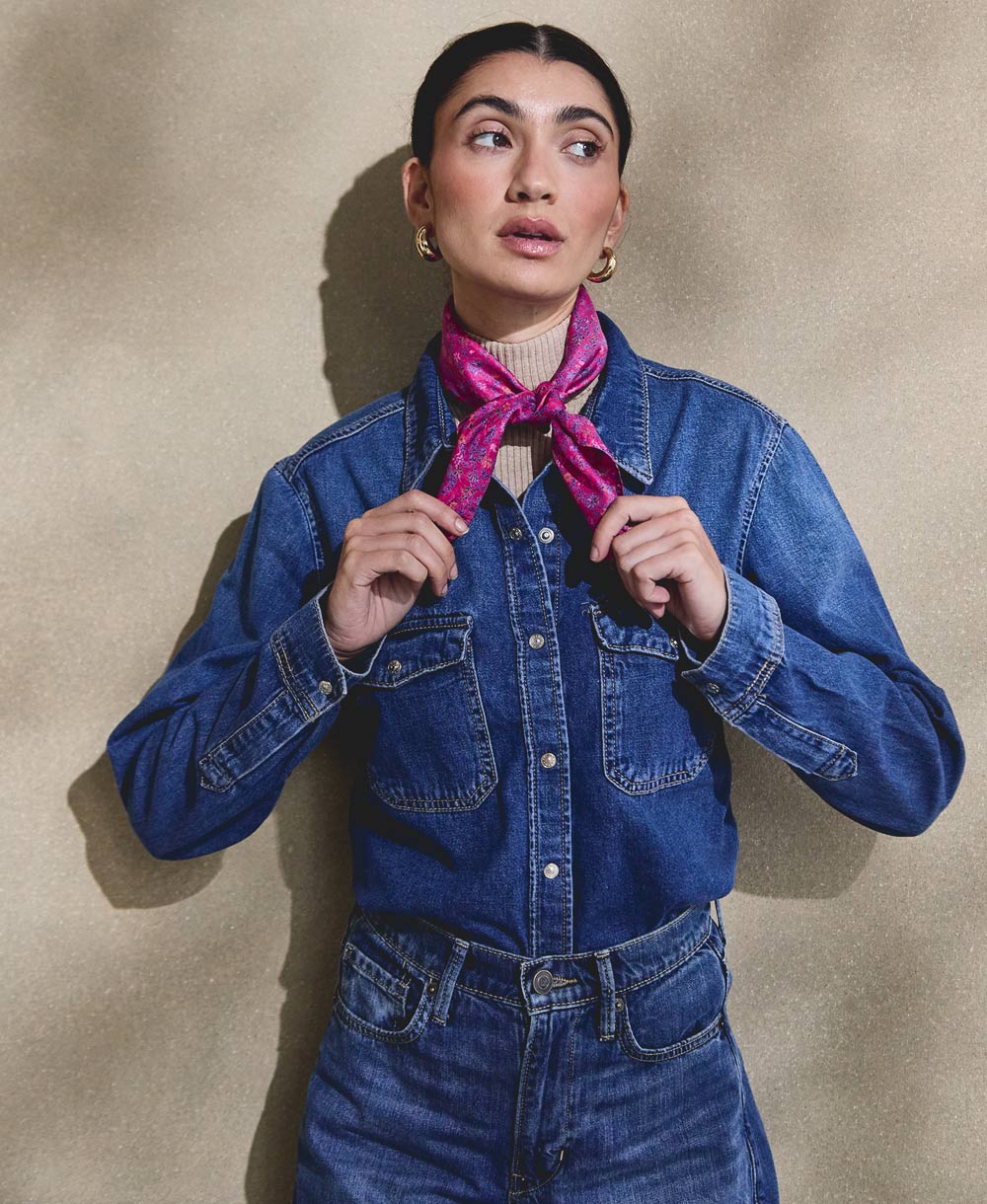 woman wearing Canadian tuxedo outfit with bright purple vintage silk bandana with blue floral pattern made from upcycled vintage saris