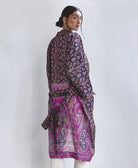 woman wearing paisley purple silk robe with long sleeves and removable belt tie