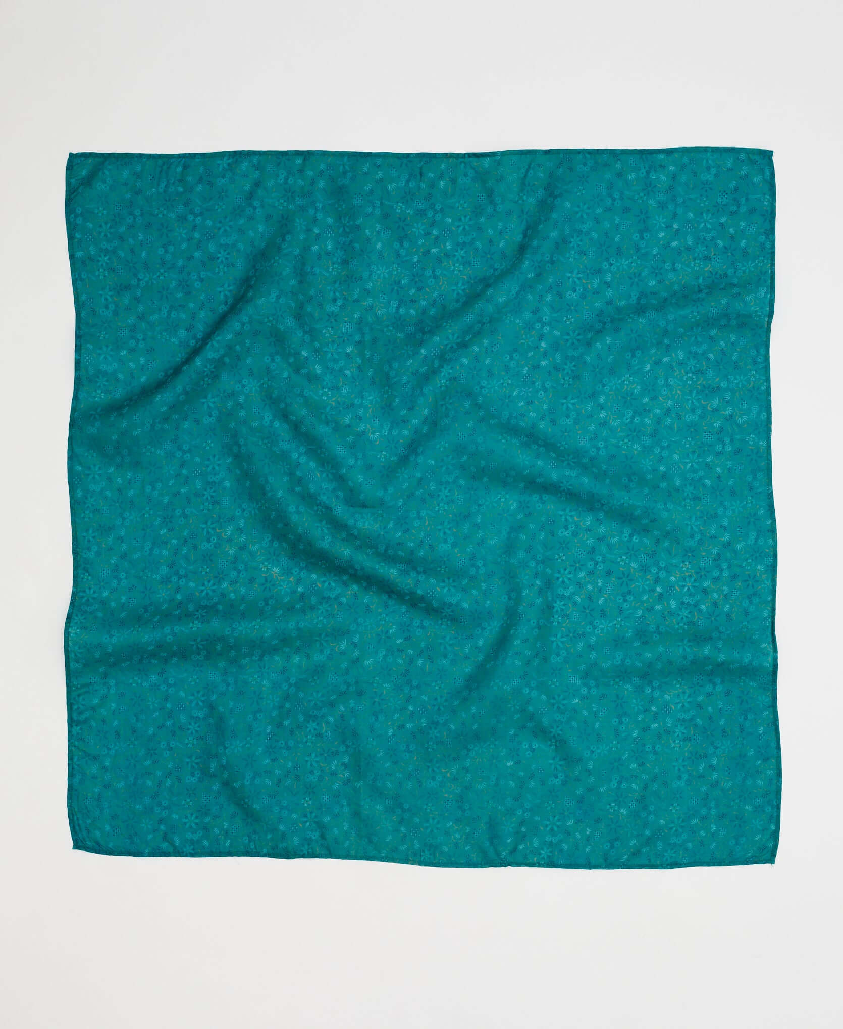 teal sik square scarf with delicate floral pattern made from upcycled silk saris in India