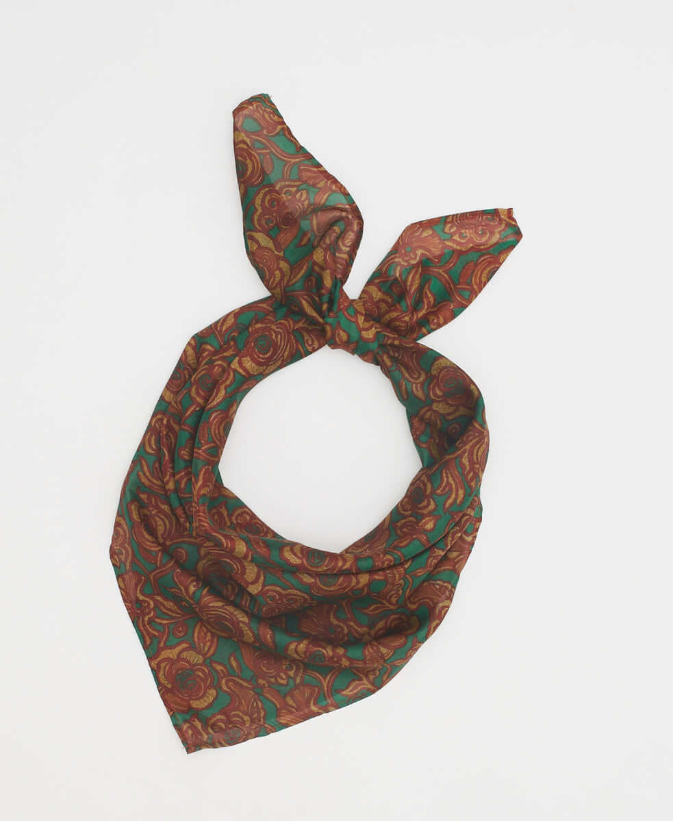 emerald green silk square scarf featuring  a golden and red floral pattern