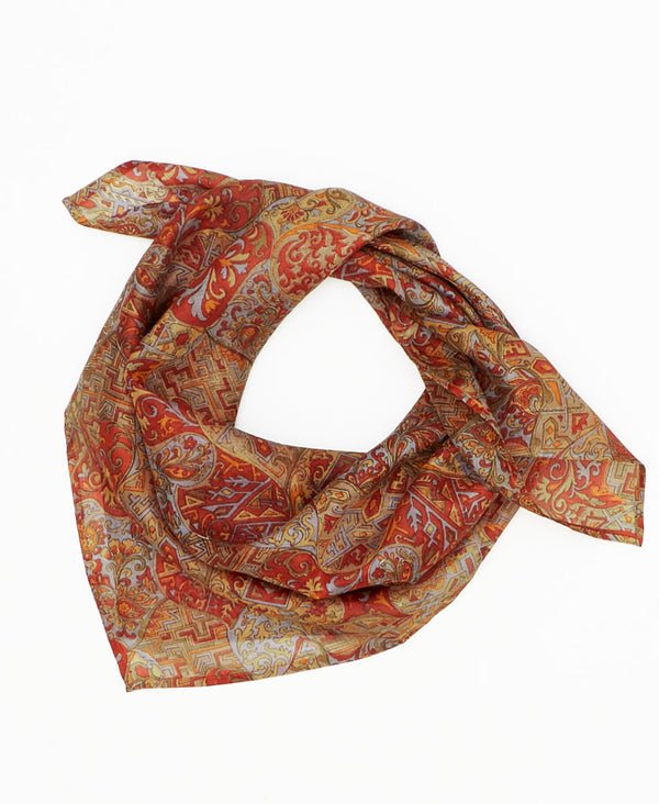 orange vintage silk square scarf featuring geometric shapes created using sustainably sourced saris