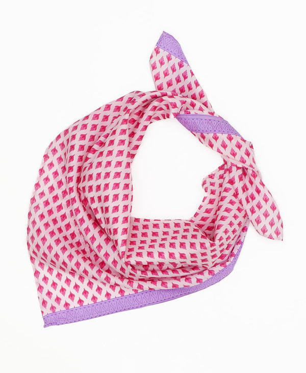 white vintage silk square scarf featuring pink geometric shapes created using sustainably sourced saris