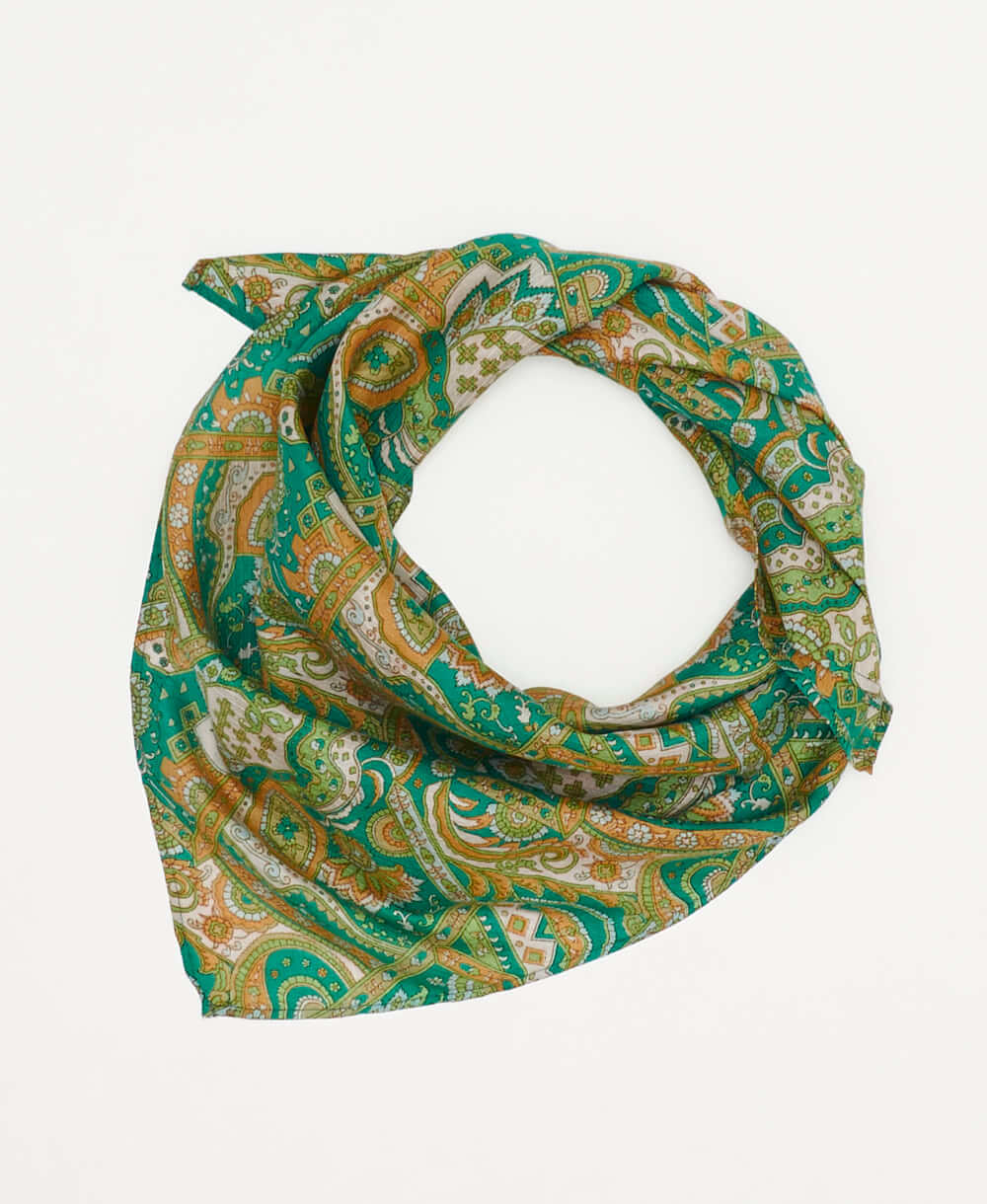 vintage silk square scarf featuring an orange and teal paisley pattern  created using sustainably sourced saris