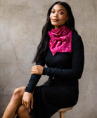 woman wearing a vintage silk scarf tied around her neck made from repurposed silk saris