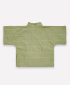 sustainable baby top in wrap style with wide bell sleeves in sage green with white horizontal embroidery