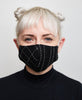 Fitted black cotton face mask which helps to protect against the coronavirus 