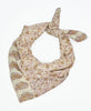 white cotton square scarf with flowers and paisleys and traditional kantha stitching along the edges